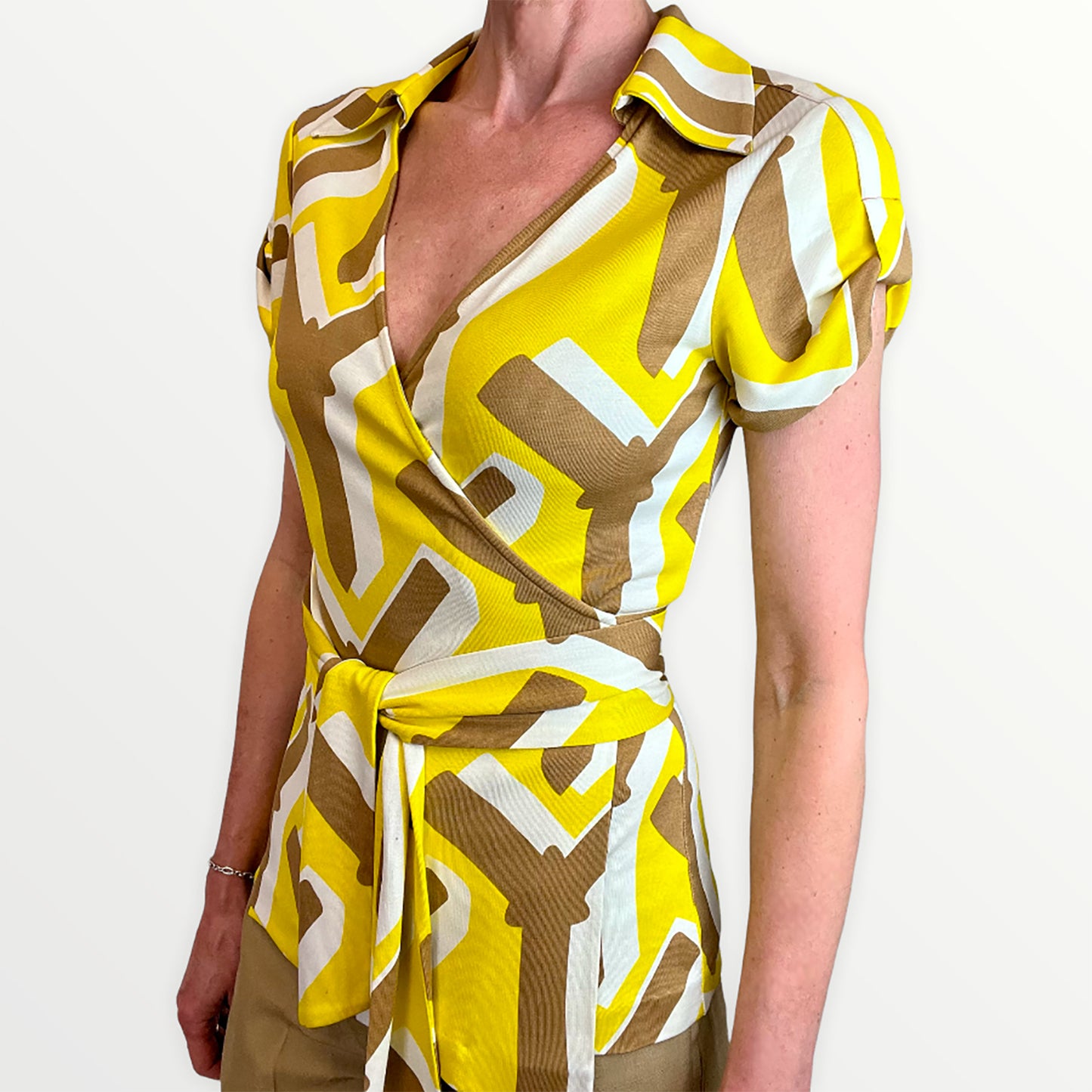 Diane Von Furstenberg yellow graphic silk wrap top front close up
