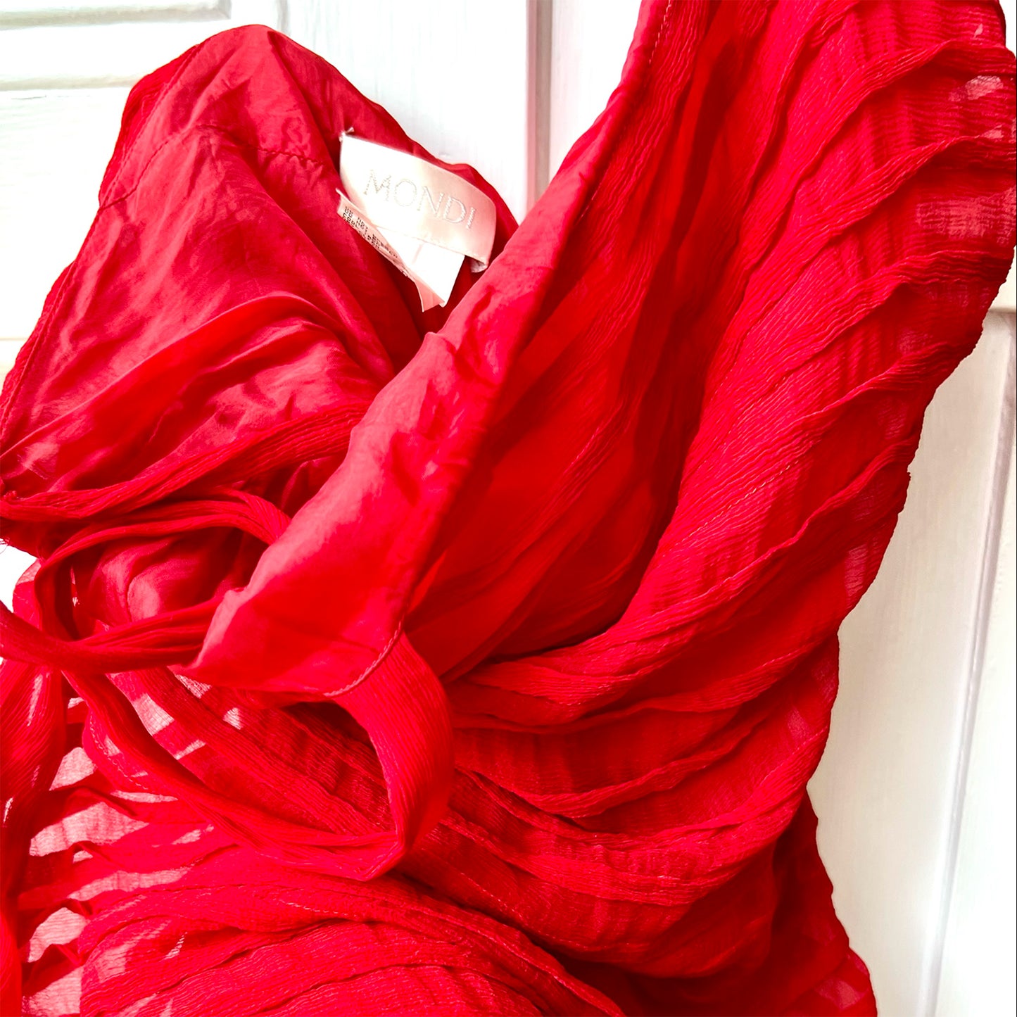 Mondi red silk fishtail dress brand detail